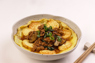 Sizzling Japanese Tofu is Food In Chinese Restaurant in Singapore and Malaysia, These Silky Egg Tofu With Minced Meat Sauce. 