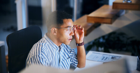 Planning, night and online with business man in office for profit margin report, profile and...