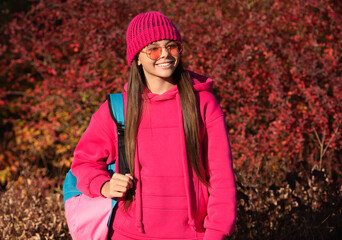 autumn girl carrying school bag. education for adolescence. teen girl in autumn park outdoor. autumn is a time to study. knowledge and education. school education. back to school. generation z