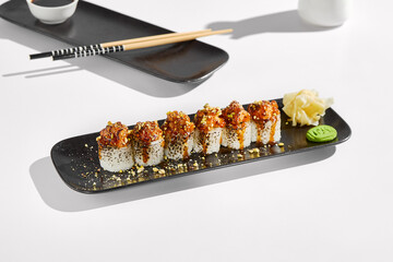 Burned Salmon Sushi Rolls – Modern Food Photography with High Contrast and Minimalist Composition