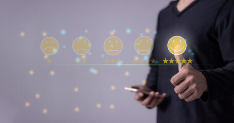 Consumer Satisfaction, Young Man with smartphone mobile hand touching five star to review and give 5 stars with very good results in service, Good review 5 star rating choice feedback