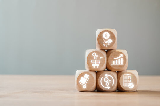 Wooden blocks with business icons representing a request for proposal concept, ideal for corporate strategy and planning visuals.
