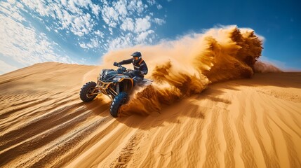 Off-road quad bike racing through sand dunes on a sunny day