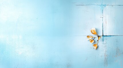 A captivating light blue grunge backdrop with abstract art elements, suitable for enhancing the aesthetic of fashion collections or art galleries.