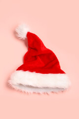 Santa Claus hat on pink background