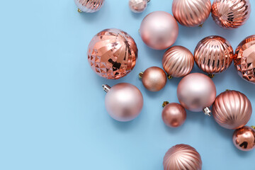Composition with Christmas balls on blue background