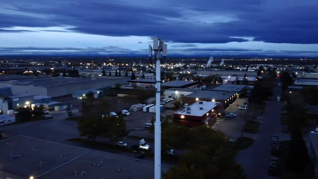 Sunrise drone shot of a cellular tower in Calgary.