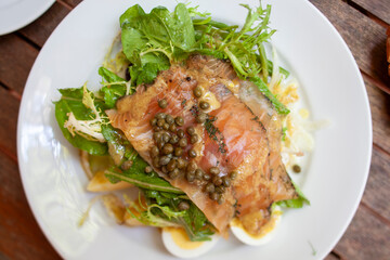 Overhead looking down on salad with salmon