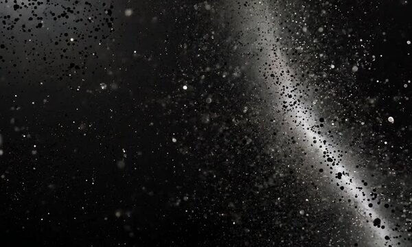 Abstract dotwork background featuring a gradient of black grain textures