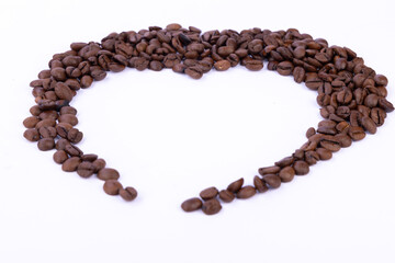 Heart Shape Made with Coffee Beans on White Background