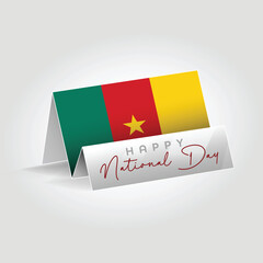 Cameroon country paper flag standing on the ground. Happy national day flag design.