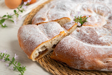 Ensaimada from Mallorca, a typical Balearic dessert. Round cake made of butter and sugar filled...