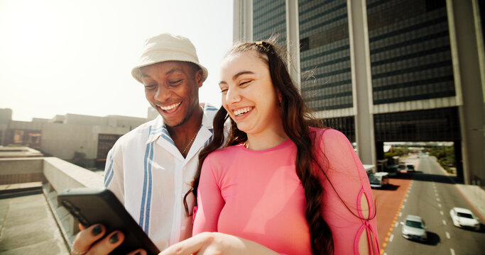 Phone, social media and funny with people in city for networking, communication and streaming. Post, notification and comment with gen z friends laughing for subscription, viral and mobile app - Powered by Adobe