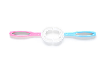 Children's toothbrushes on white background