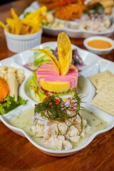 Trío marino con ceviche de pescado, pulpo al olivo y causa de cecina