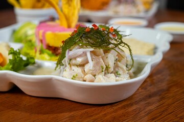 Trío marino con ceviche de pescado, pulpo al olivo y causa de cecina