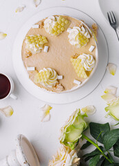 Elegant vanilla cake with floral decoration