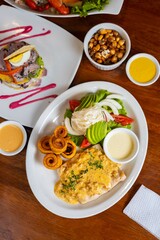 Filete de Parche en salsa de chorizo y cocona