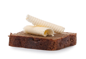 Slice of bread with fresh butter swirls on white background