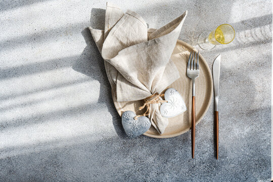 Table setting with hearts for holiday dinner