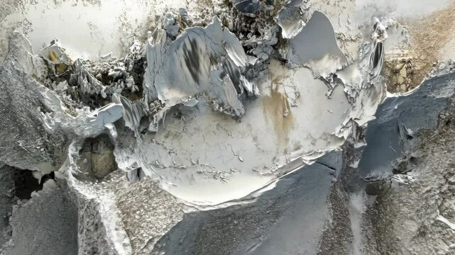 This is a close-up of a gray and white abstract painting