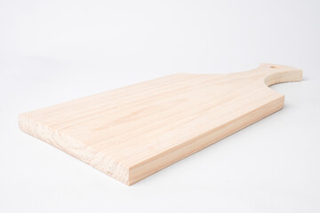 Close-up photo of Wooden cutting board isolated on white background.