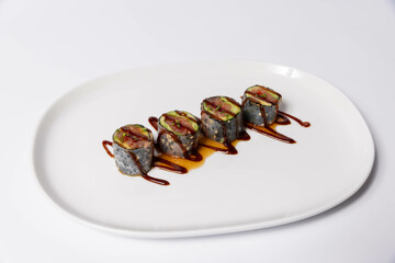 Sushi serving on white plate