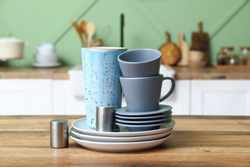 Clean dishes on table in kitchen, closeup