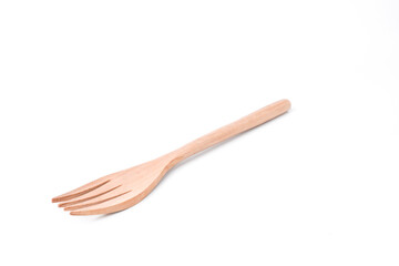 Close-up photo of wooden table fork isolated on white background. Shot on 30 Degree angle setup.