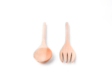 Close-up photo of wooden table spoon and fork isolated on white background. Shot on 30 Degree angle, Bundling setup.