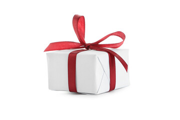 Christmas gift box with red ribbon on white background