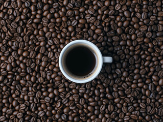 Fototapeta premium Minimalistic Coffee Cup Surrounded by Roasted Coffee Beans on Black Background 