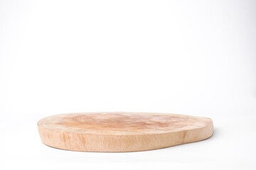 Close-up photo of Wooden cutting board made from cutted whole tree trunk isolated on white background. Shot on eye-level angle setup.