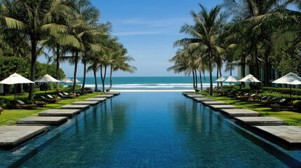Fototapeta premium Serene Beachfront Pool with Palm Trees and Ocean View