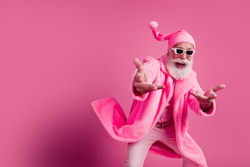 Photo of crazy fashionable grandfather man wear stylish coat have fun cool party event isolated on pink color background