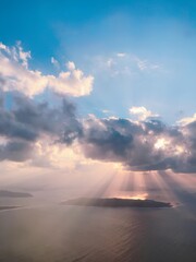 Soft hues, fluffy clouds, serene atmosphere