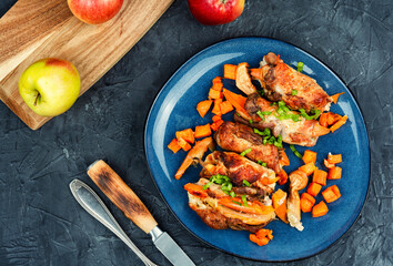 Homemade meat roll with apples and sweet potatoes.