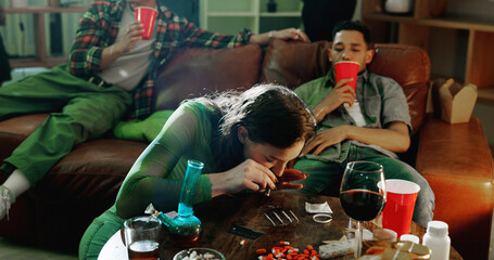 People, house party and woman with cocaine, night and illegal substance with alcohol. Group, event...
