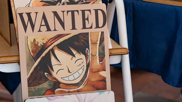 Budokan Geek Convention In GUAYAQUIL, ECUADOR - 
OCT 13, 2024 - Close-up of a One Piece &ldquo;Wanted&rdquo; poster featuring Monkey D. Luffy, the main character of the popular anime and manga series. Collectible