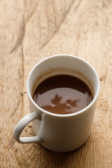 Cup of hot chocolate in white cereamic cup