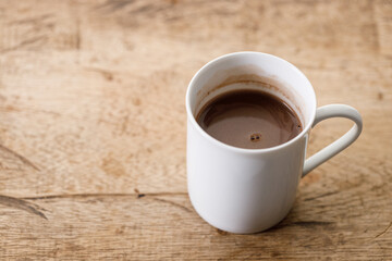 Cup of hot chocolate in white cereamic cup