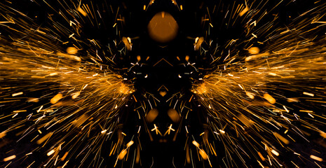Bright yellow sparks on a black background