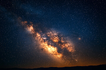 Fototapeta premium Stunning view of the Milky Way galaxy over a serene landscape at night