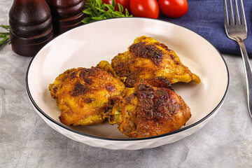 Roasted chicken thighs  with spices