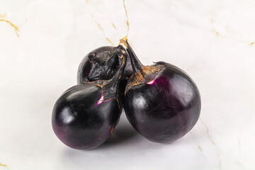 Raw violet and black eggplant