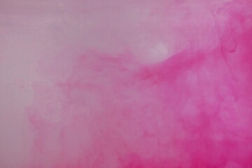 Pink color dye melt on white background,Abstract smoke pattern,Colored liquid dye,Splash paint