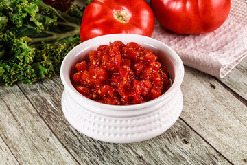 Diced ripe tomato with sauce