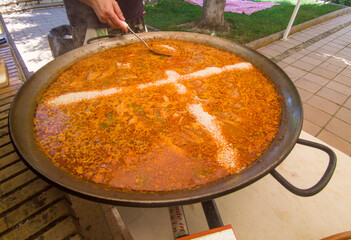 Preparation of mixed valencian paella