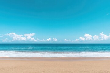 Fototapeta premium Calm tropical beach with gentle waves and blue sky on a sunny day