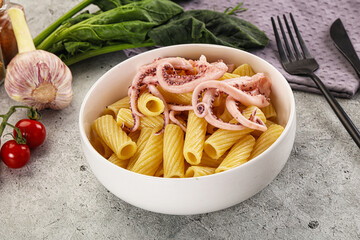 Italian cuisine - pasta tortiglioni with squid